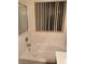 Bathtub and window in the bathroom, offering natural light at 4382 Valley Regal Way, North Las Vegas, NV 89032
