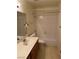Bathroom featuring a combined tub and shower, toilet, and sink with vanity at 4382 Valley Regal Way, North Las Vegas, NV 89032