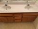 Bathroom vanity featuring double sinks and ample cabinet space at 4382 Valley Regal Way, North Las Vegas, NV 89032