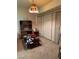 Cozy dining area featuring a unique light fixture and vertical blinds at 4382 Valley Regal Way, North Las Vegas, NV 89032