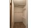 A compact walk-in closet with shelving for organized storage solutions at 4382 Valley Regal Way, North Las Vegas, NV 89032