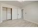 Bedroom featuring wood-look flooring, storage, and doorway at 4454 Harmony Ct, Las Vegas, NV 89121