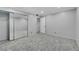 A bedroom with mirrored closet doors and neutral walls at 4680 Freshwater Dr, Las Vegas, NV 89103