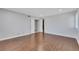 Bedroom featuring hardwood floors, light gray walls, and doors at 4680 Freshwater Dr, Las Vegas, NV 89103