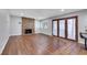 Cozy living room featuring a brick fireplace and hardwood floors at 4680 Freshwater Dr, Las Vegas, NV 89103