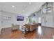 Open-concept living area with vaulted ceilings and modern furnishings at 4680 Freshwater Dr, Las Vegas, NV 89103