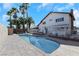 Back of house showcasing the sparkling pool and outdoor living space, ideal for enjoying the warm weather at 4680 Freshwater Dr, Las Vegas, NV 89103