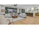 Open concept living room flowing into a kitchen with island and barstool seating at 4718 Atlantico St, Las Vegas, NV 89135
