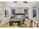 Inviting main bedroom with large windows, plush bedding, and stylish furniture at 4718 Atlantico St, Las Vegas, NV 89135