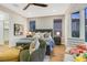 Bright main bedroom featuring large windows, stylish decor, and comfortable seating for a relaxing retreat at 4718 Atlantico St, Las Vegas, NV 89135