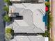 Overhead view highlighting the unique roofline and property layout with pool, patio, and surrounding landscaping at 5 Moonfire Dr, Las Vegas, NV 89135