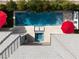 Aerial view showcasing the pool, hot tub, grilling area, and stylish layout of this backyard oasis at 5 Moonfire Dr, Las Vegas, NV 89135