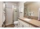 Sleek bathroom with glass shower, modern fixtures, and a well-lit vanity area, promoting relaxation at 5 Moonfire Dr, Las Vegas, NV 89135
