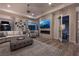 Spacious living room with modern fireplace, large TV, stylish decor, and plush seating arrangements at 5 Moonfire Dr, Las Vegas, NV 89135