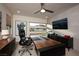 Elegant office space with a large wooden desk, ambient lighting, and a sleek contemporary design at 5 Moonfire Dr, Las Vegas, NV 89135