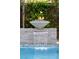 Luxurious pool with a fire feature and cascading waterfall for a relaxing outdoor ambiance at 5 Moonfire Dr, Las Vegas, NV 89135