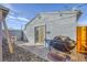 Backyard features a barbecue, sliding glass door, and plenty of room to entertain at 517 7Th St, Boulder City, NV 89005