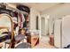 Functional bedroom with hardwood floors, natural light, and organized closet at 517 7Th St, Boulder City, NV 89005