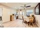 Bright breakfast nook with natural light, a ceiling fan, backyard view, and additional storage space at 517 7Th St, Boulder City, NV 89005