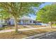 Lovely single-story home with a rock garden and well-manicured front lawn at 517 7Th St, Boulder City, NV 89005