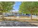 Charming single-story home with a well-maintained front yard and mature trees at 517 7Th St, Boulder City, NV 89005