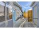 Home exterior with blue accents, accessible ramp, and sitting area at 517 7Th St, Boulder City, NV 89005