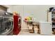Well-equipped laundry room with appliances and storage, featuring modern washer and dryer units at 517 7Th St, Boulder City, NV 89005