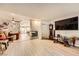Open-concept living room with laminate flooring and seamless flow to other areas at 517 7Th St, Boulder City, NV 89005