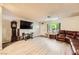 Spacious living room featuring laminate flooring, vintage accents, and natural light at 517 7Th St, Boulder City, NV 89005