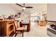 Inviting living room with hardwood floors, ceiling fan, desk area and modern fireplace at 517 7Th St, Boulder City, NV 89005