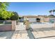 Charming single story home with gated entry and well-maintained landscaping at 5181 Morris St, Las Vegas, NV 89122