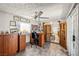 Bright home office featuring tile floors, a ceiling fan, and backyard views at 5181 Morris St, Las Vegas, NV 89122