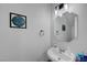 Compact powder room with a sink and modern mirror at 5221 Tropical Peach Dr, Las Vegas, NV 89118