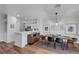 Bright dining room with modern table and chairs at 5221 Tropical Peach Dr, Las Vegas, NV 89118