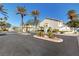 Gated community entrance with manicured landscaping and a sign that reads 'Villa Pacifica' at 5221 Tropical Peach Dr, Las Vegas, NV 89118
