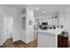 Bright kitchen with white cabinets and modern appliances at 5221 Tropical Peach Dr, Las Vegas, NV 89118