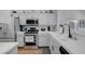 Bright kitchen with stainless steel appliances and white countertops at 5221 Tropical Peach Dr, Las Vegas, NV 89118