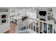 Lofted view of a open-concept living space featuring a modern kitchen and comfortable seating area at 5221 Tropical Peach Dr, Las Vegas, NV 89118