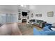Bright living room with fireplace, built-ins, modern decor, and stylish furniture at 5221 Tropical Peach Dr, Las Vegas, NV 89118