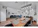 Open concept living and dining area with hardwood floors and modern decor at 5221 Tropical Peach Dr, Las Vegas, NV 89118