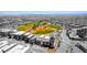 Modern homes located in a planned community with a baseball field and lush green park at 5436 Succulent Rose Dr, Las Vegas, NV 89135