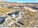 Aerial view of the community clubhouse, fire pits, landscaping, and modern amenities, set in the desert landscape at 5436 Succulent Rose Dr, Las Vegas, NV 89135