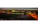 Enjoy a night view of the city skyline over the sports field at 5436 Succulent Rose Dr, Las Vegas, NV 89135