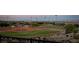 A beautiful sports field provides a delightful view of the city skyline in the distance at 5436 Succulent Rose Dr, Las Vegas, NV 89135