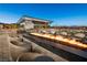 Outdoor seating area with chairs around a fire pit at 5436 Succulent Rose Dr, Las Vegas, NV 89135