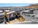 Contemporary two-story home with modern architecture, desert landscaping, and a paved driveway in a planned community at 5436 Succulent Rose Dr, Las Vegas, NV 89135