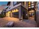 Modern home showcasing garage with sleek door and stylish walkway leading to the entrance at 5436 Succulent Rose Dr, Las Vegas, NV 89135