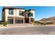 Contemporary two-story home featuring a two-car garage and xeriscaped front yard at 5436 Succulent Rose Dr, Las Vegas, NV 89135