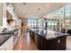 Open kitchen design featuring a large island, modern appliances, and ample natural lighting at 5436 Succulent Rose Dr, Las Vegas, NV 89135
