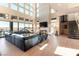 Expansive living room boasting floor-to-ceiling windows, stylish decor, and lots of natural light at 5436 Succulent Rose Dr, Las Vegas, NV 89135